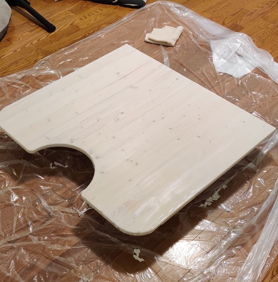 Desk-topper surface in progress, finished in a light stain to match office environment